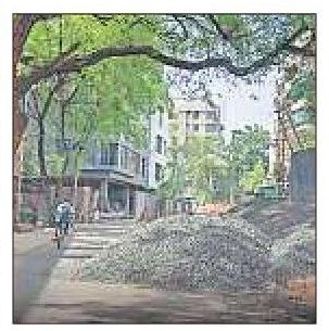 Roadside construction waste chokes city corridors