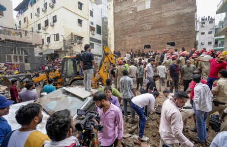 People trapped under debris calling on phones for help... 5 killed as 5-storey hostel collapses in Delhi